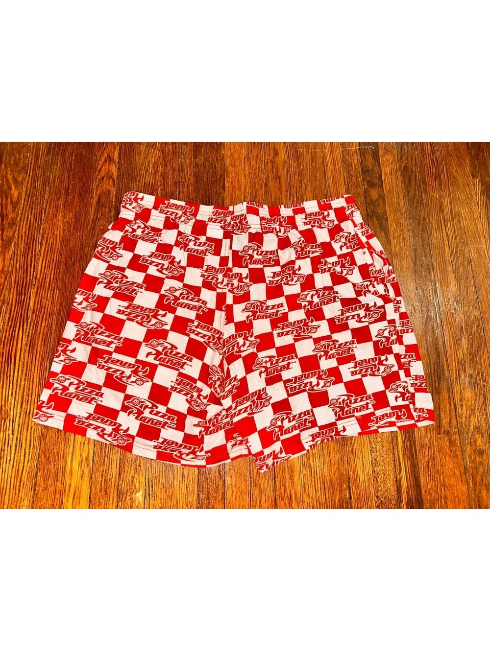 Men’s Large Disney's Pixar Toy Story Pizza Planet Checkered Lounge Shorts in Red
